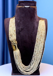 Stunning pearls long haram with radha krishna pendant and gold colour finishing